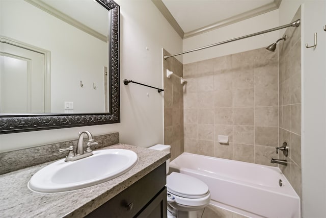 full bathroom featuring toilet, tiled shower / bath, crown molding, and vanity