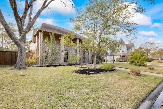 view of front of home with a front yard