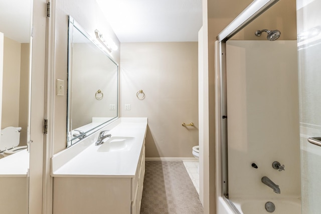 full bathroom featuring toilet, vanity, and enclosed tub / shower combo