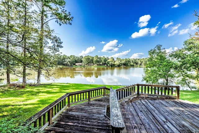 1915 E Lake Dr, Huntsville, TX 77340 - deck featuring a water view and a yard
