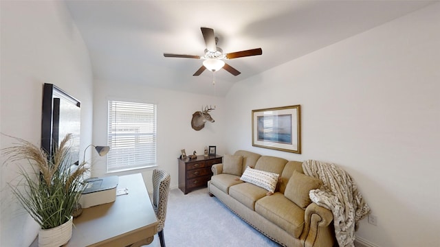 living room with ceiling fan, light carpet, and lofted ceiling