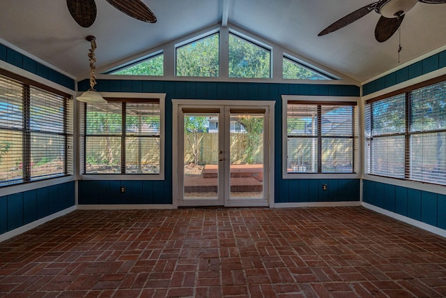 unfurnished sunroom featuring ceiling fan and lofted ceiling