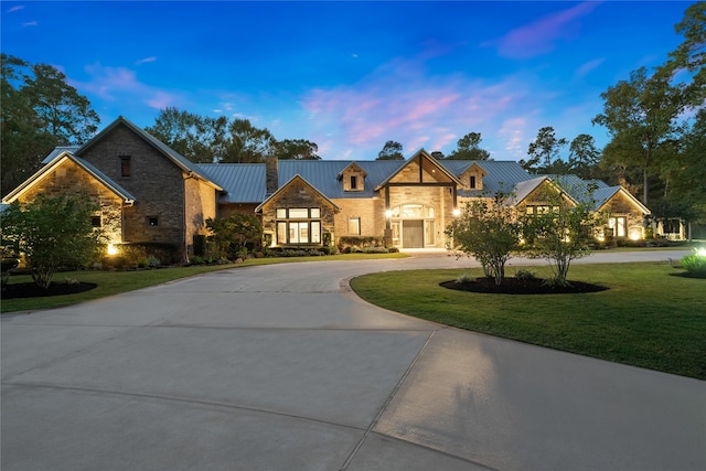 view of front of home featuring a yard