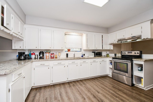 kitchen featuring sink, hardwood / wood-style flooring, white cabinets, and appliances with stainless steel finishes