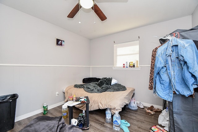 bedroom featuring hardwood / wood-style flooring and ceiling fan