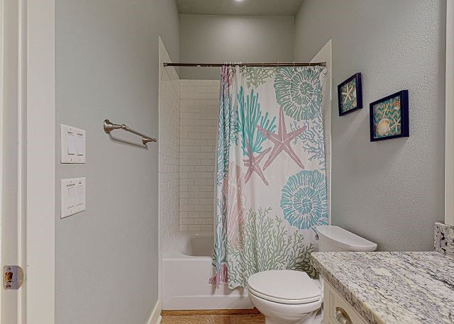 full bathroom with vanity, toilet, and shower / bath combo