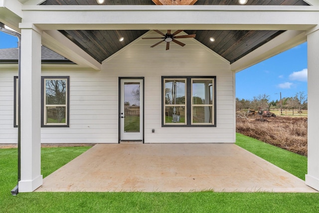 view of patio featuring ceiling fan