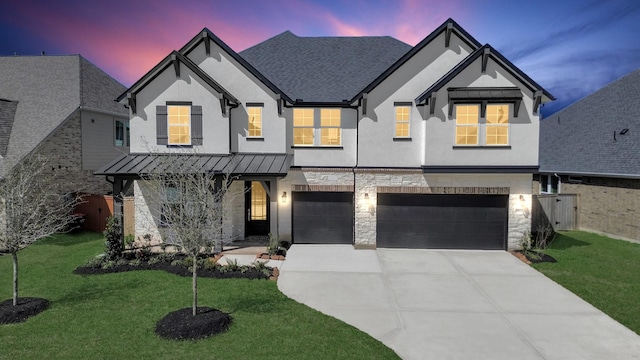 view of front facade with concrete driveway, an attached garage, stone siding, and stucco siding