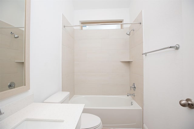 full bathroom with toilet, vanity, and tub / shower combination