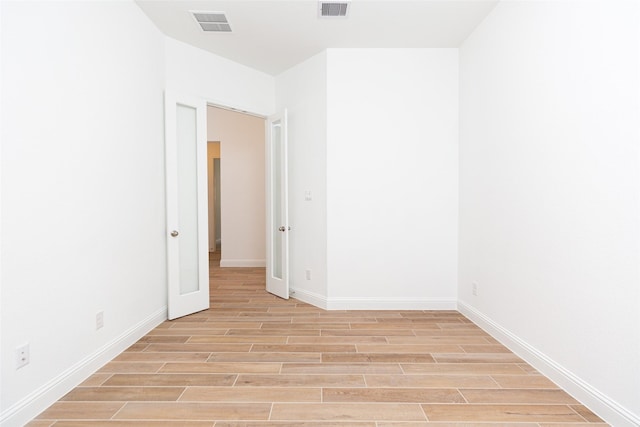 empty room with light wood-type flooring