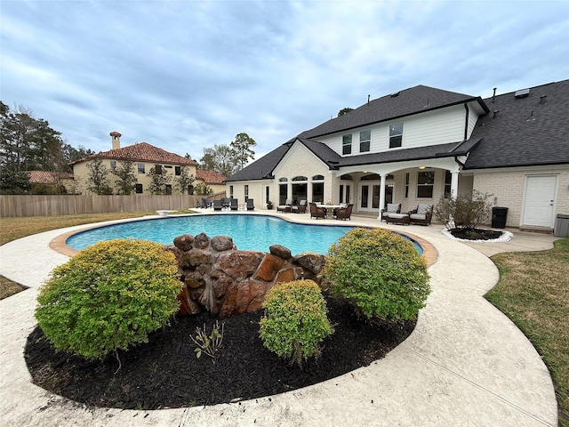 view of pool with a patio and an outdoor hangout area