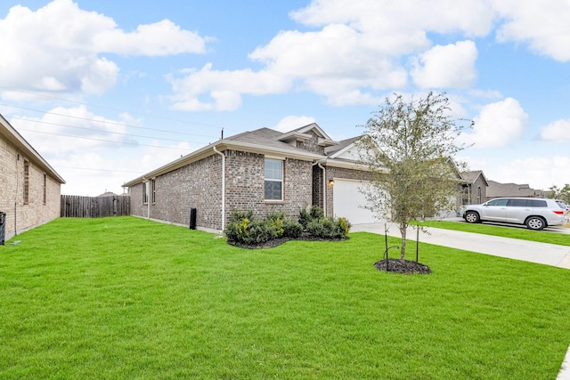 view of front facade with a front lawn and a garage