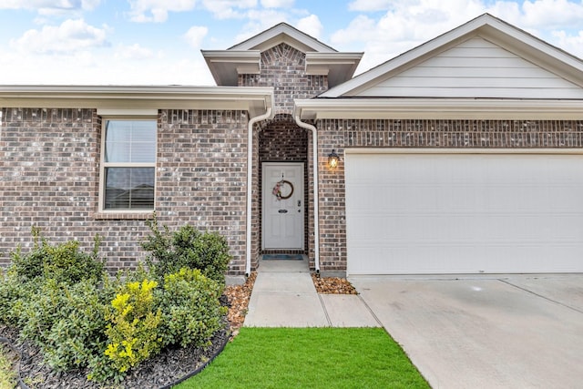 view of front of home with a garage