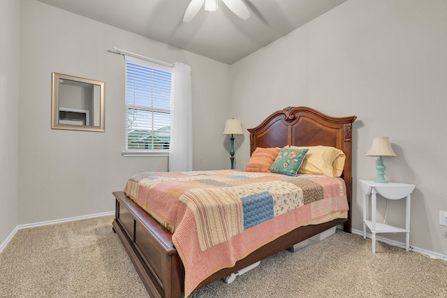 bedroom with ceiling fan and light colored carpet