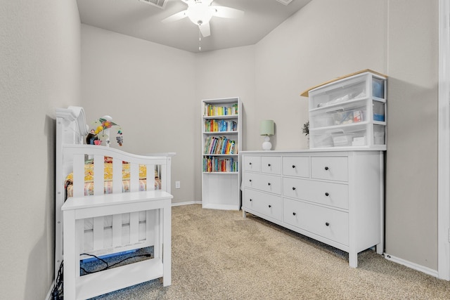 carpeted bedroom with ceiling fan