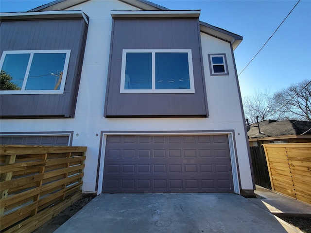 view of side of home with a garage