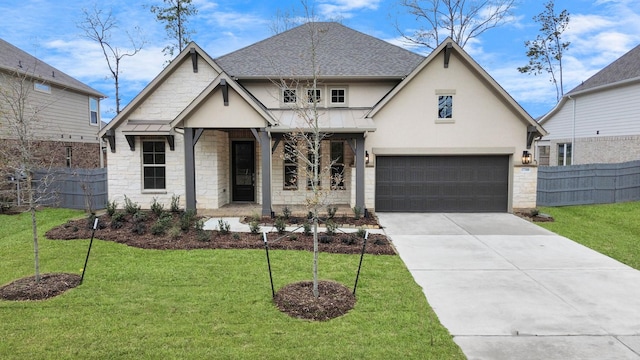 view of front of house with a front lawn and a garage