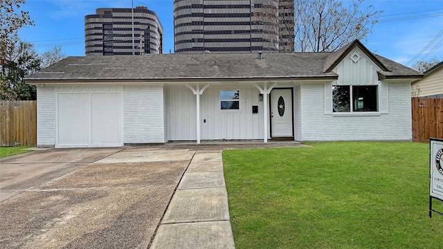 ranch-style home featuring a front lawn, central air condition unit, and covered porch