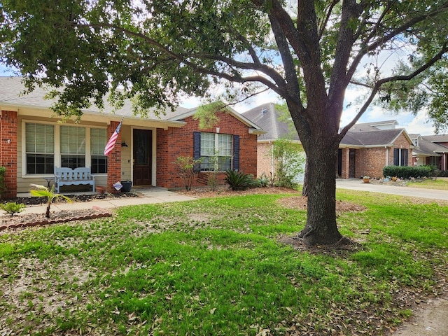 ranch-style house with a front yard