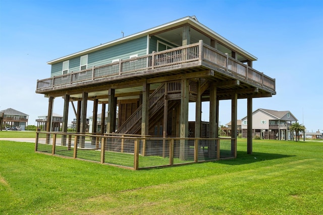 view of home's community with a yard