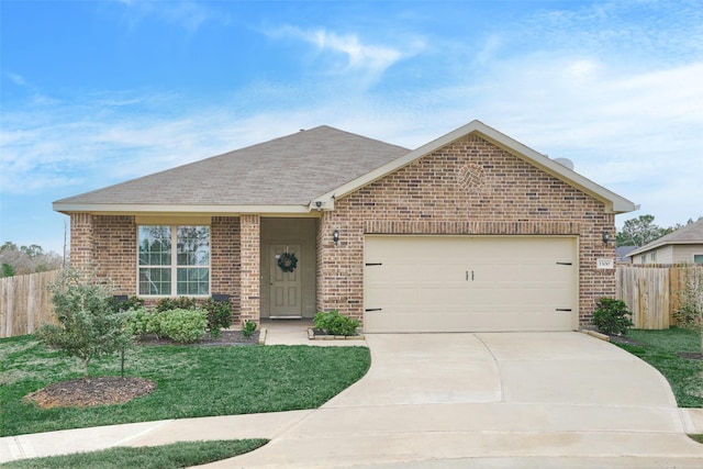 single story home with a garage and a front lawn