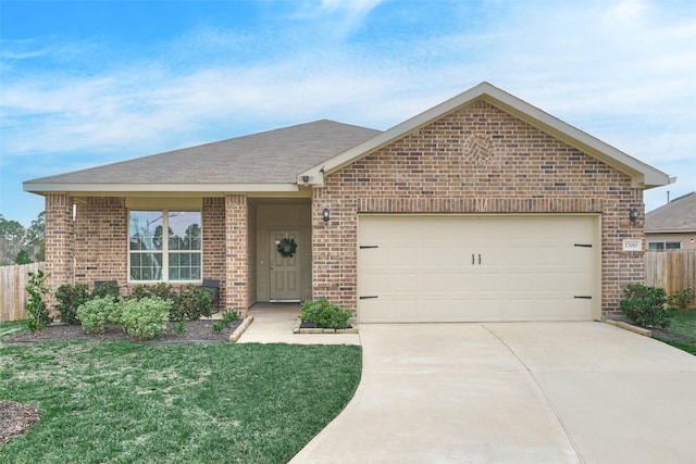 ranch-style house featuring a front yard and a garage