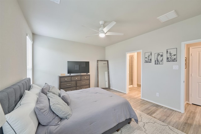 bedroom featuring ceiling fan and light hardwood / wood-style floors