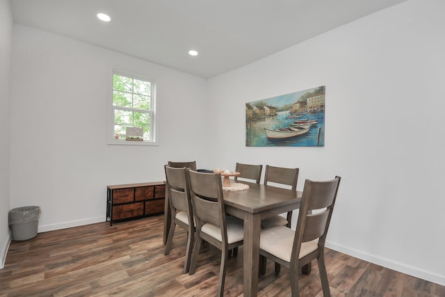 dining area featuring dark hardwood / wood-style flooring