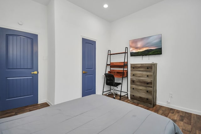 bedroom featuring dark hardwood / wood-style floors