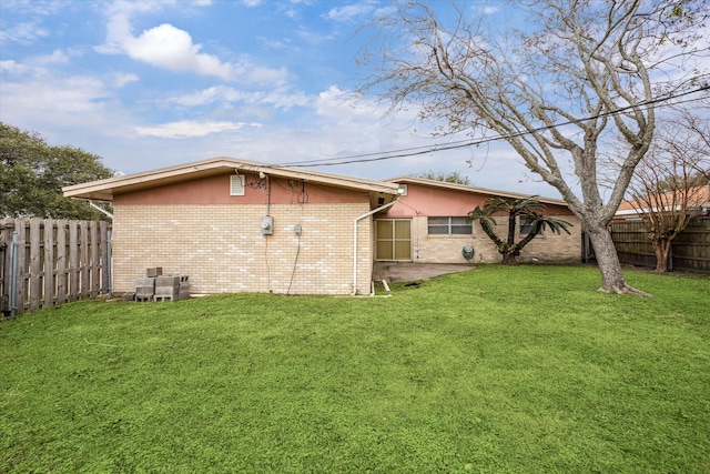 view of property exterior featuring a lawn