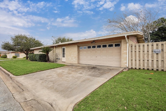 ranch-style house with a front yard and a garage