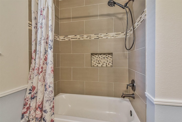 bathroom with shower / tub combo