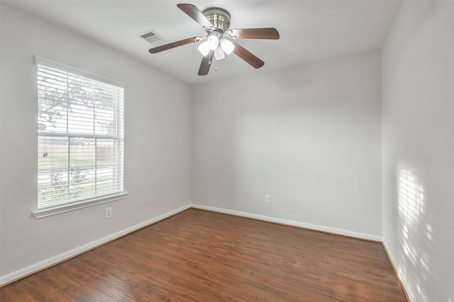 unfurnished room featuring ceiling fan and dark hardwood / wood-style floors