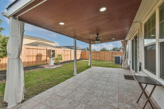 view of patio with ceiling fan and cooling unit