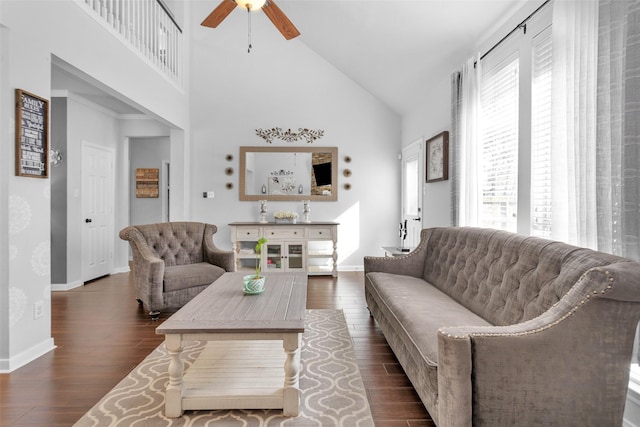 living room featuring ceiling fan, high vaulted ceiling, and dark hardwood / wood-style floors