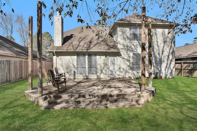 back of house with a yard and a wooden deck