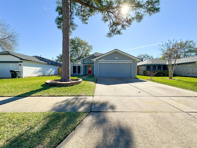 single story home with a garage and a front yard