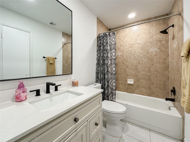 full bathroom with toilet, tile patterned floors, shower / bath combo, and vanity