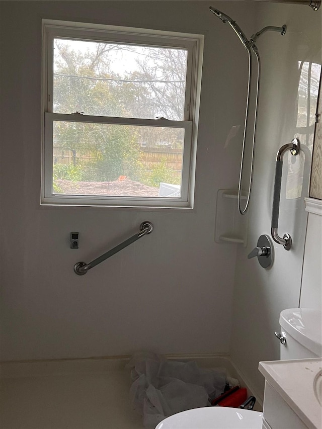 bathroom featuring vanity and a wealth of natural light