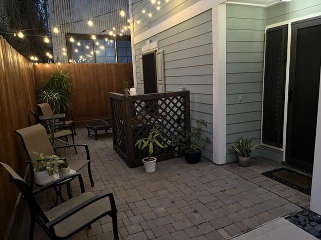 view of patio / terrace featuring a fire pit