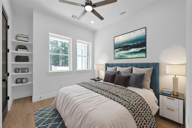 bedroom featuring ceiling fan and light wood-type flooring