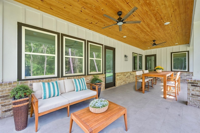 view of patio with ceiling fan and an outdoor hangout area