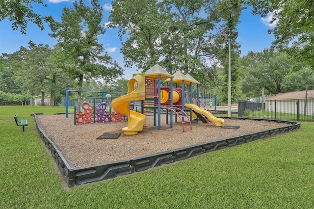 view of playground featuring a lawn