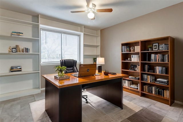 office space with ceiling fan