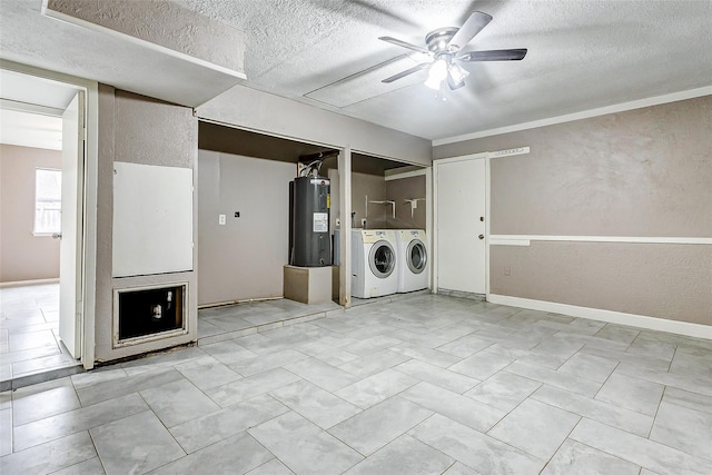 laundry area with water heater, a textured ceiling, ceiling fan, and separate washer and dryer