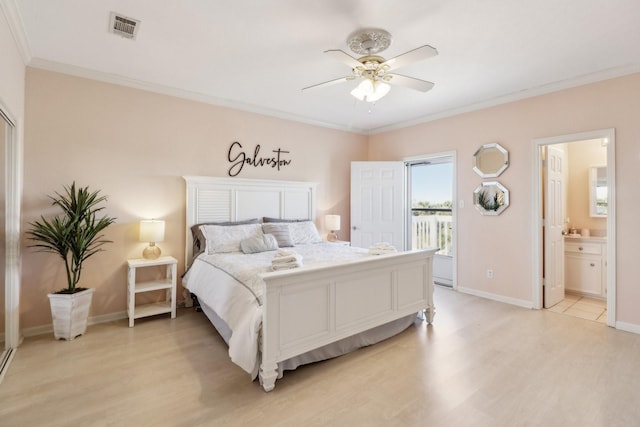 bedroom featuring ceiling fan, light hardwood / wood-style floors, connected bathroom, and crown molding