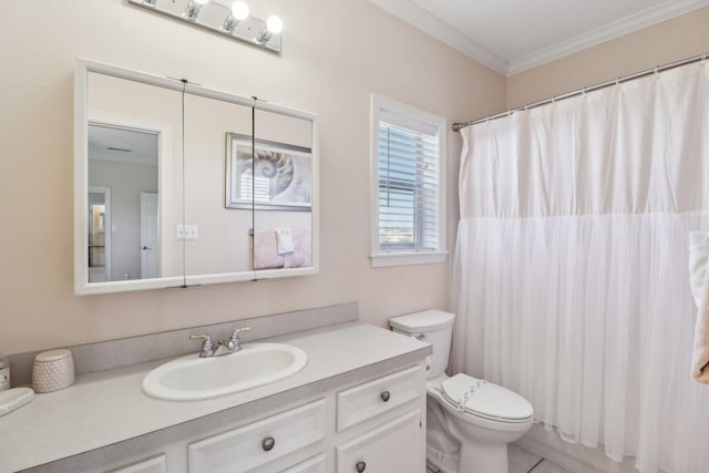 bathroom featuring ornamental molding, vanity, and toilet