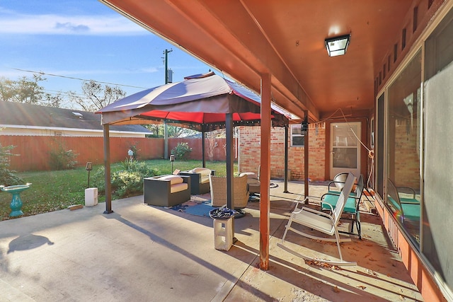 view of patio / terrace with a gazebo and an outdoor hangout area