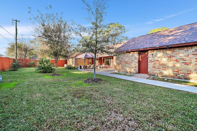 view of yard with a patio area and a gazebo