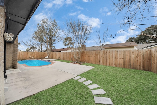 exterior space with a patio and a yard